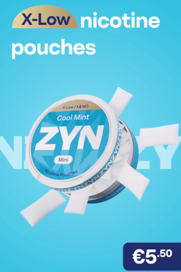 Woman wearing a blue sweater, listening to music while trying a ZYN nicotine pouch