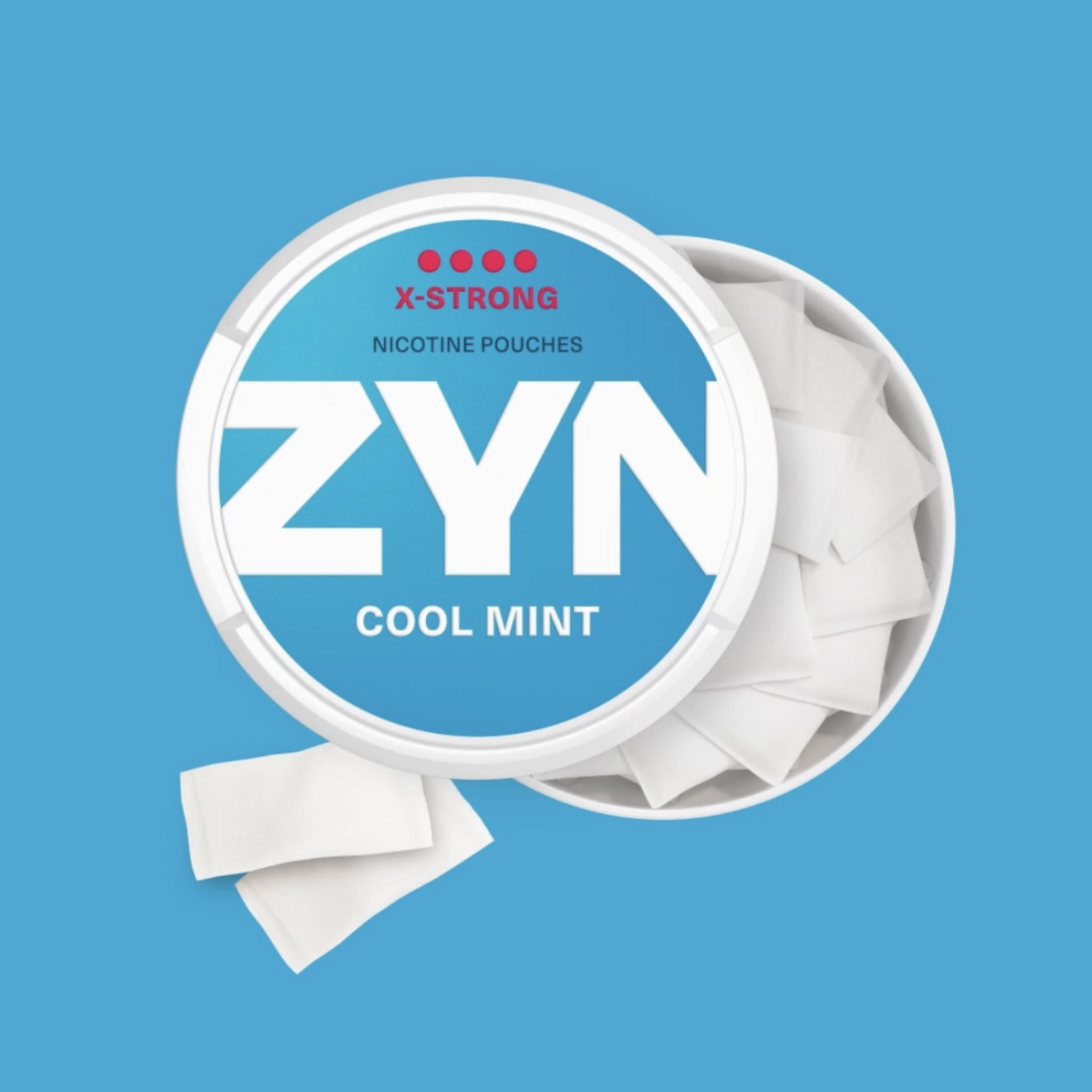 ZYN COOL MINT - открытая голубая банка никотиновых паучей и две паучи рядом с ней