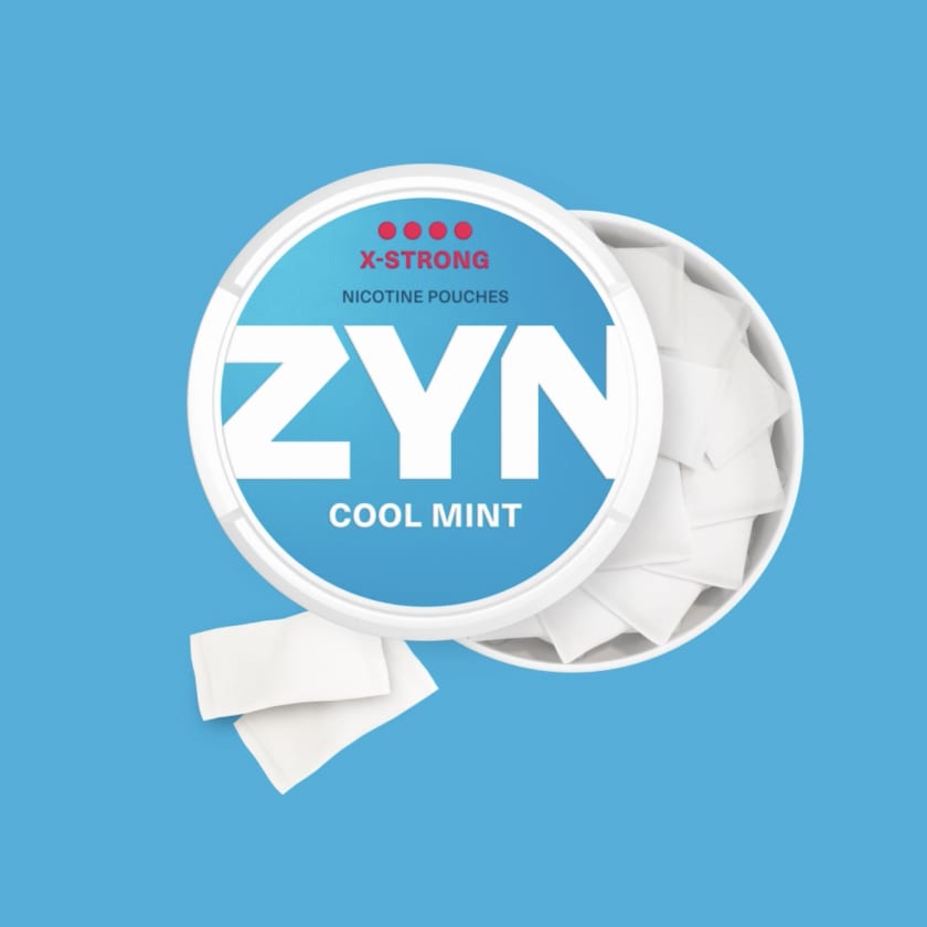 ZYN COOL MINT - an open, light blue nicotine pouch can