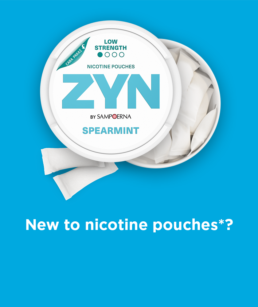 ZYN COOL MINT - an open, light blue nicotine pouch can with 2 pouches next to it